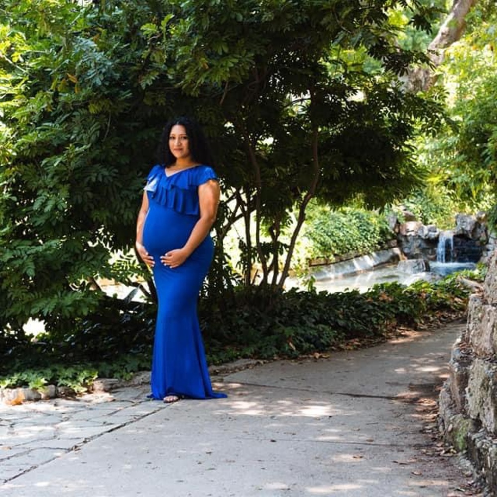 Beautiful, long, blue maternity gown. Great for a photo shoot